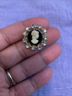 Coro Gold-Tone Black and Cream Cameo Brooch with Clear Stones